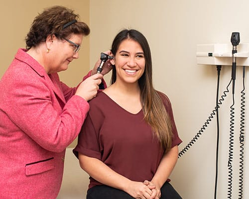 Medical Careers at Stepping Stone Center for Recovery female patient having her ears examined by female doctor