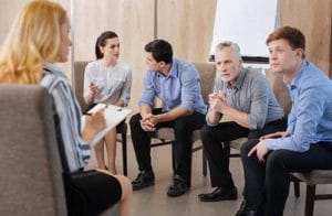 a group therapy session available at Addiction Treatment Programs