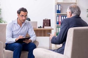 a doctor talking to a patient about bipolar treatment center 