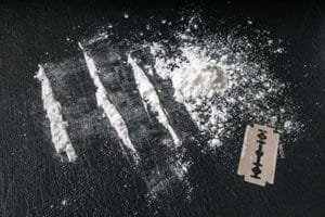 Lines of cocaine indicate the need for a cocaine addiction treatment center