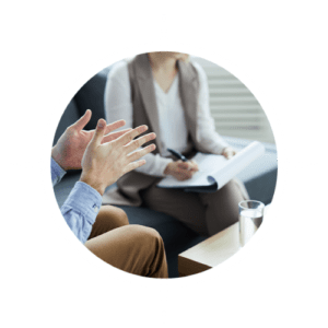 stepping stone center for recovery compass image man gesturing while speaking to counselor300x300