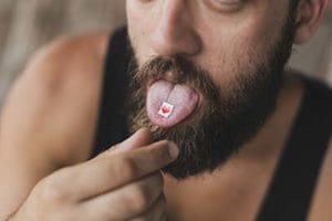 man takes LSD before seeking treatment at an LSD detox center