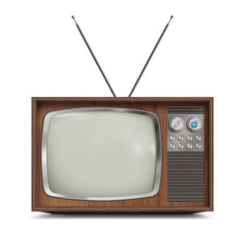 an older model television set with a rabbit ears antenna